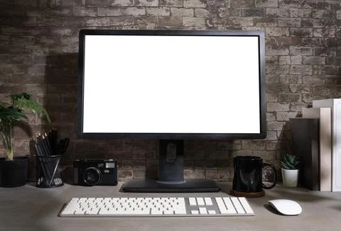 Creative, stylish workspace with blank screen desktop computer, books, came.. Stock Photos