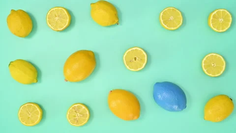 Creative summer citrus fruits pattern. Fresh yellow and blue lemons. Stop motion Video stock 192513458