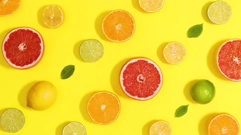 Creative summer  fresh pattern made of citrus fruits and leaves. Stop motion Video stock 152544131