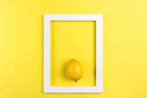 Creative summer layout made of lemon on yellow background. Minimal summer exo Stock Photos