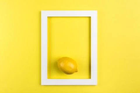 Creative summer layout made of lemon on yellow background. Minimal summer exo Stock Photos