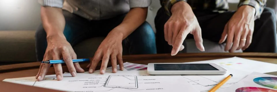 Creative team analyzing prototype products for product design in Coworking Sp Foto stock