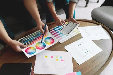 Creative team analyzing prototype products for product design in Coworking Sp Foto stock