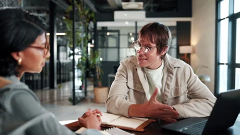Creative, team and happy people with laptop in office, talking or planning for Stock Footage 338005908