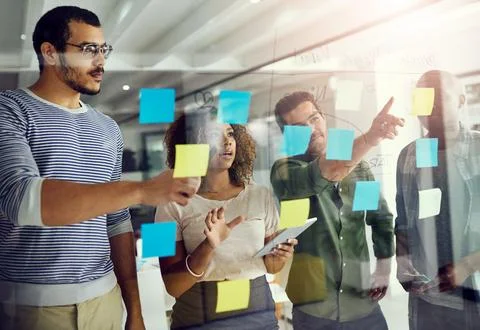 Creative, team and sticky notes on glass for strategy, timeline and design 스톡 사진