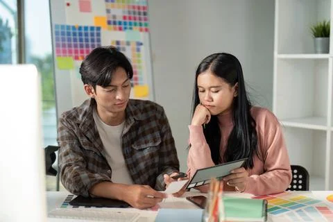 Creative team design collaboration in modern workspace graphics development Stock Photos