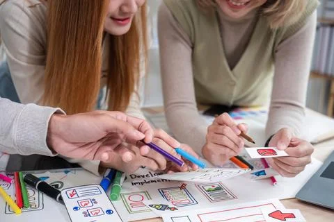 Creative team of designers in application design and ux ui usability planning 스톡 사진