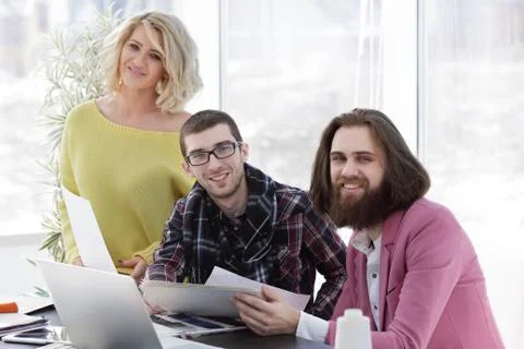 Creative team of designers in the workplace in the Studio Foto stock