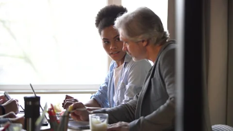 Creative team discussing new project. Casual young people in new business office Stock Footage 171788352