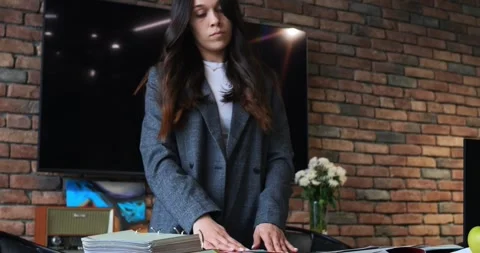 Creative team of interior designers in collaborative meeting, analyzing various Stock Footage 276407044