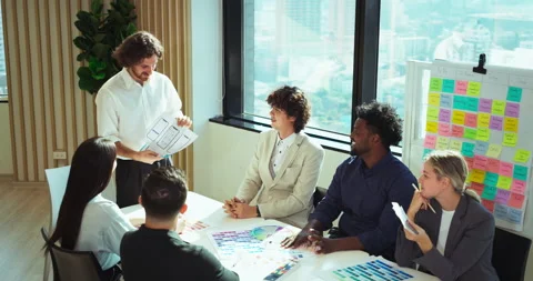 Creative team planning brand strategy in office Stock Footage 306097061