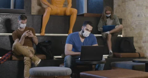 Creative team of programmers sitting in casual open space and surfing Internet Stock Footage 142226109