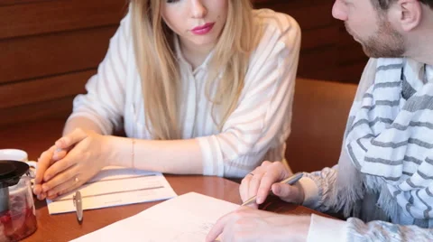 Creative team at work in a cafe Stock Footage 62687886