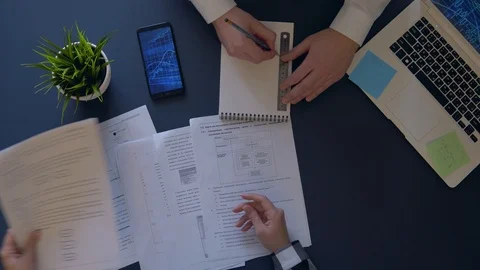 Creative team working on a business project in the office sitting at the table Stock Footage 102344242