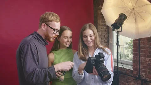 Creative team working in photo studio Stock Footage 118130983