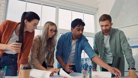 Creative Team Working on Table. Creative Office Work. Team Discussing Ideas Stock Footage 217525544