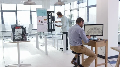 Creative team working together in a modern office Stock Footage 106750615