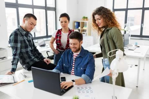 Creative team working on user interface at office 스톡 사진