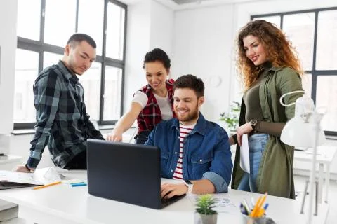 Creative team working on user interface at office Stock Photos