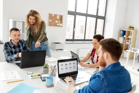 Creative team working on user interface at office Foto stock
