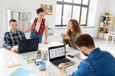 Creative team working on user interface at office 스톡 사진