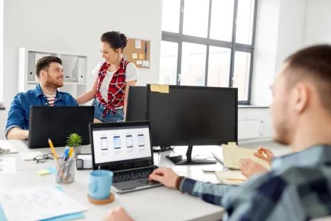 Creative team working on user interface at office Foto stock