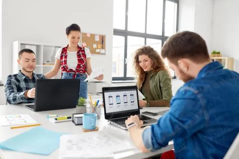 Creative team working on user interface at office 스톡 사진