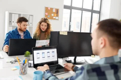 Creative team working on user interface at office 스톡 사진