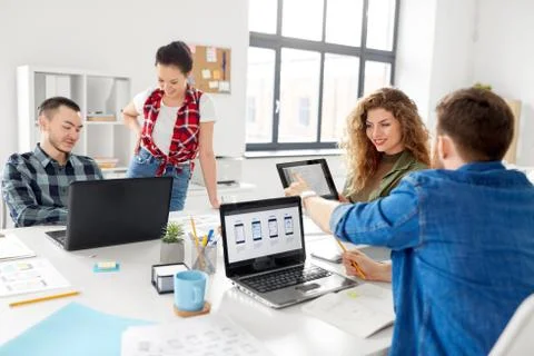 Creative team working on user interface at office 스톡 사진