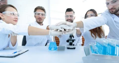 Creative team of young scientists. Stock Photos