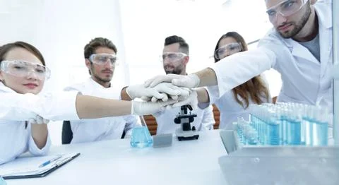 Creative team of young scientists. Stock Photos