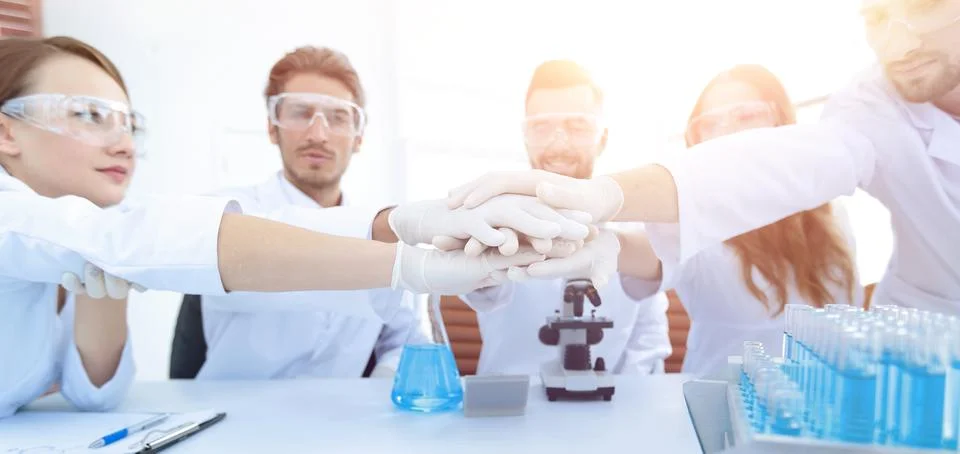 Creative team of young scientists. Stock Photos