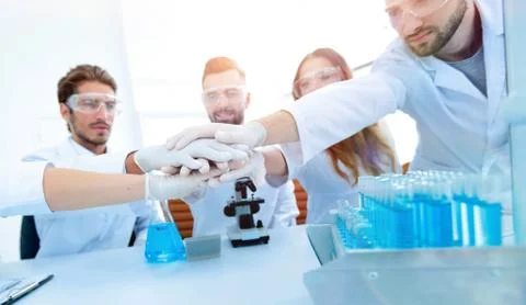 Creative team of young scientists. Stock Photos