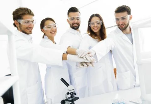 Creative team of young scientists. Stock Photos