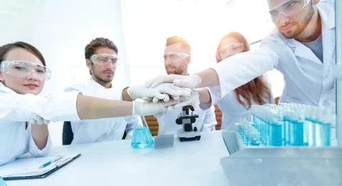 Creative team of young scientists. Stock Photos