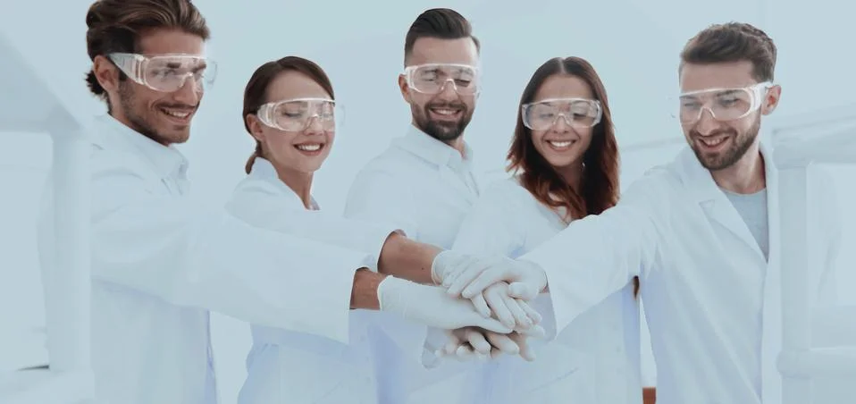 Creative team of young scientists. Stock Photos