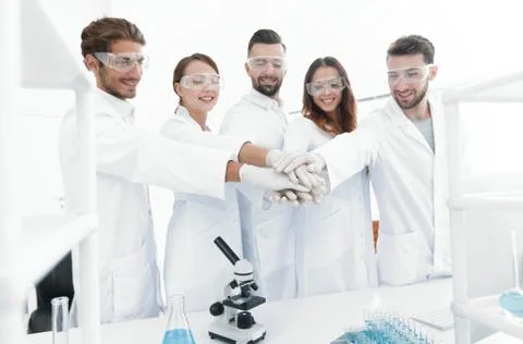 Creative team of young scientists. Stock Photos
