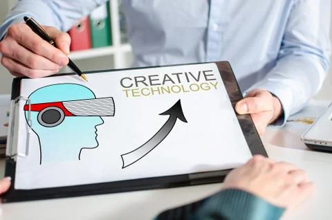 Creative technology concept on a clipboard Foto stock