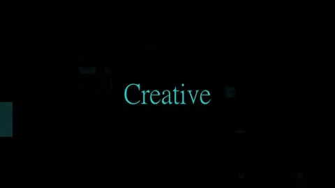 Creative text on dark background with teal fragments. Creative text for mod.. 動画素材 337816215