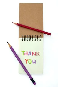 Creative Thank You Note With Colored Pencils on a Notepad With a Simple Bro.. Stock Photos