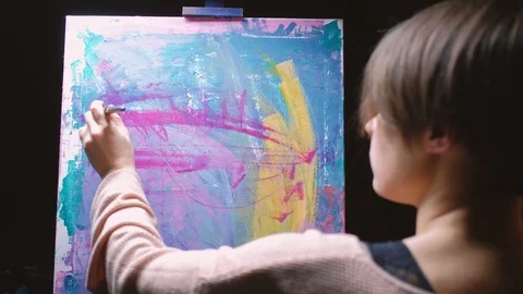 Creative therapy lefthanded artist painting brush Stock Footage 125560970