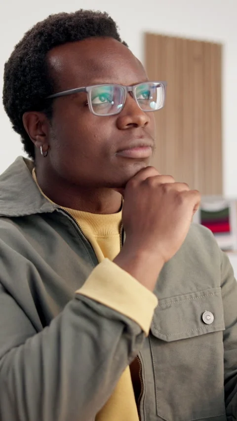 Creative, thinking and black man in office with idea, typing and graphic design Stock Footage 346817649