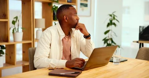 Creative, thinking and black man on laptop for business insight, problem solving Stock Photos