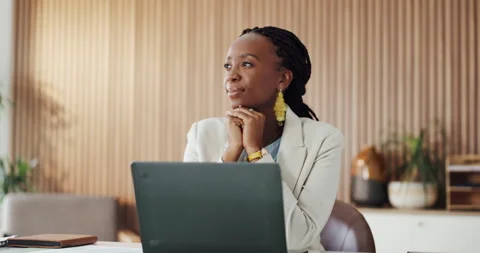 Creative, thinking and black woman in office with laptop, contemplation and Stock Footage 329341814