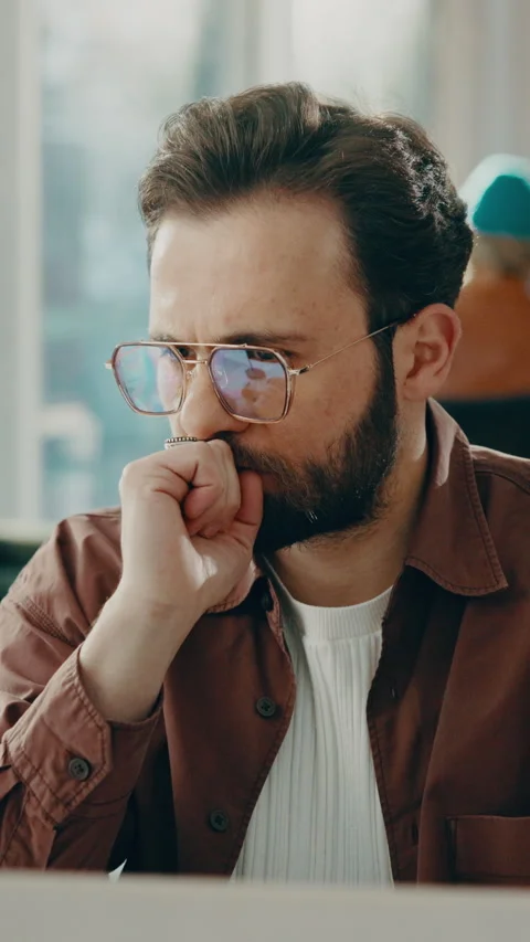 Creative, thinking and man with laptop in business, copywriting and planning for Stock Footage 338109755