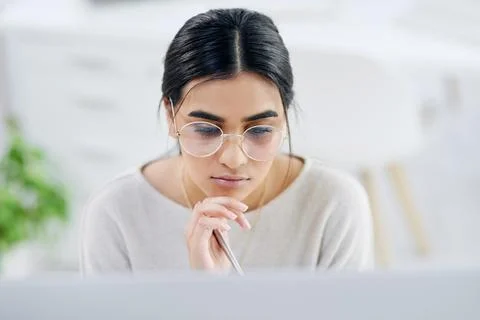 Creative, thinking and woman on computer for online report, proofreading an.. Stock Photos