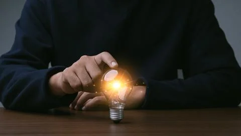 Creative thinking idea for Tecnology concept.Hand of businessman touching l.. 写真素材