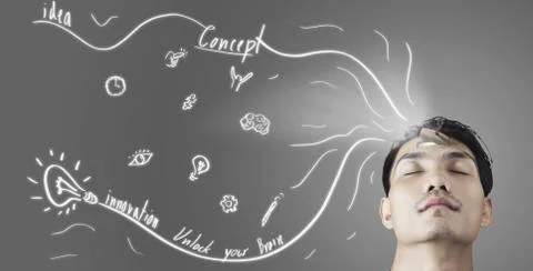 Creative thinking man open his key door in forehead let light and draw line c Stock Photos