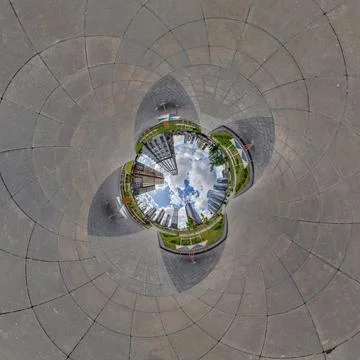 Creative tiny planet photo of a rural landscape with dirt road, green fields, Stock Photos