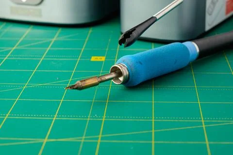 Creative tools await exploration on a vibrant green workspace Photos